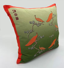 Load image into Gallery viewer, Luxe Cushion Peacocks Muster in Orange and Leaf Green on Linen/Cotton designed by Karen Bell designbybell and printed and made in Ireland sustainably on ecofriendly pigment inks
